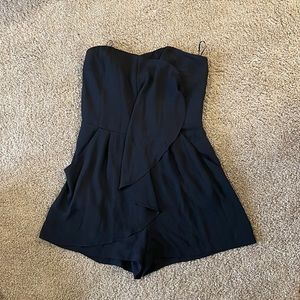 Express romper, strapless with pockets. Size 6. Black, chiffon.